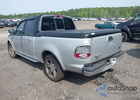 2003 Ford F-150 Lariat from USA, damaged, VIN 1FTRW07353KC79900